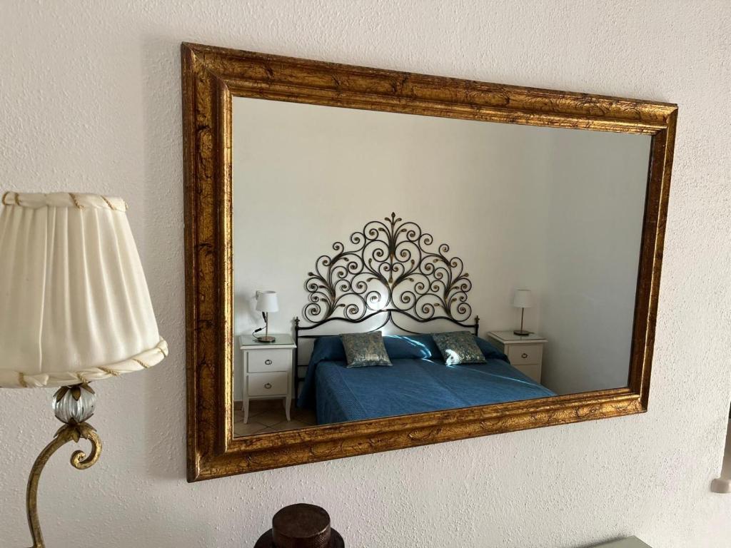 Postel nebo postele na pokoji v ubytování Chez Marie Ischia