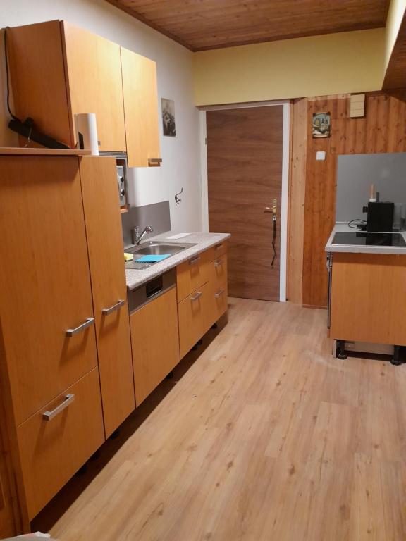 Kuchyň nebo kuchyňský kout v ubytování Apartment Gerald