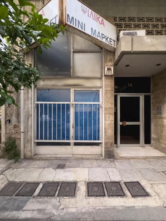 The facade or entrance of The Terrace with Acropolis & Athens view