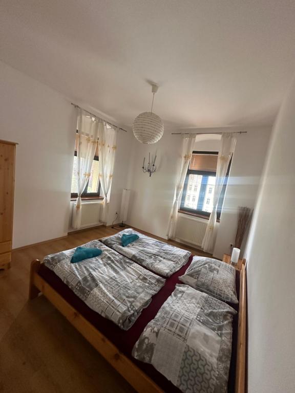 Postel nebo postele na pokoji v ubytování Apartmán na horách