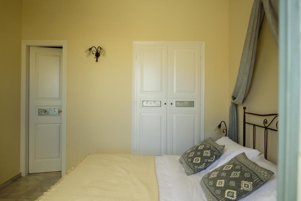 Letto o letti in una camera di Ikio Concept Santorini