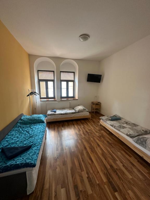 Postel nebo postele na pokoji v ubytování Apartmán na horách