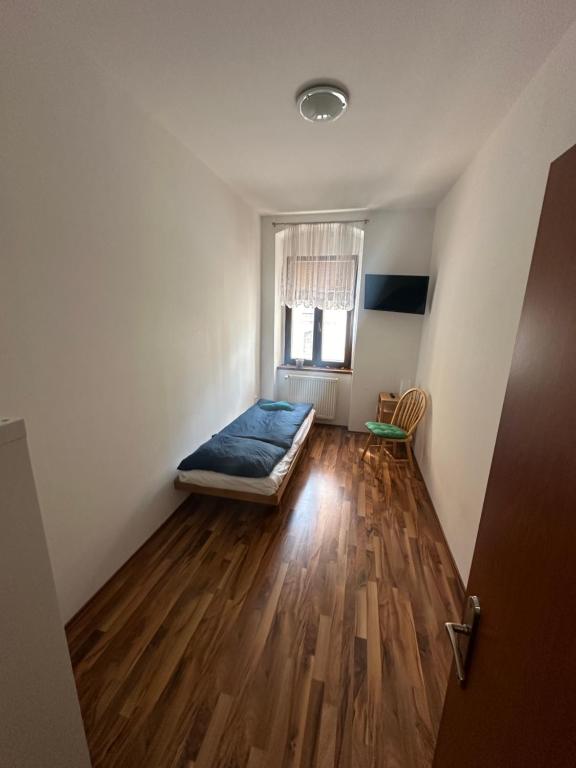 Postel nebo postele na pokoji v ubytování Apartmán na horách
