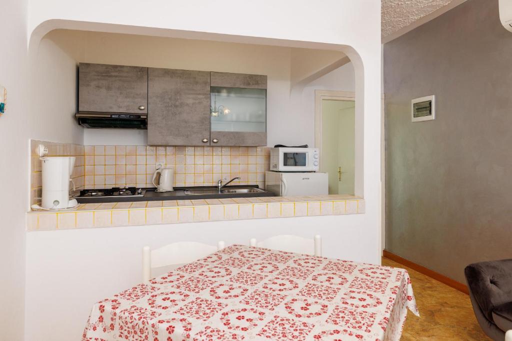 Kuchyň nebo kuchyňský kout v ubytování Apartments Marija G