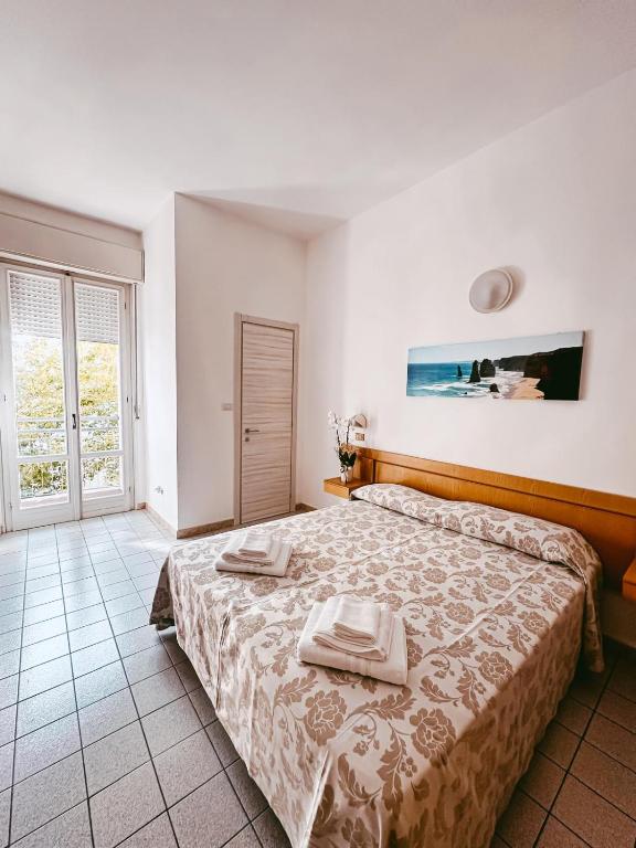 Postel nebo postele na pokoji v ubytování Hotel Paglierani - Nuova gestione 2024