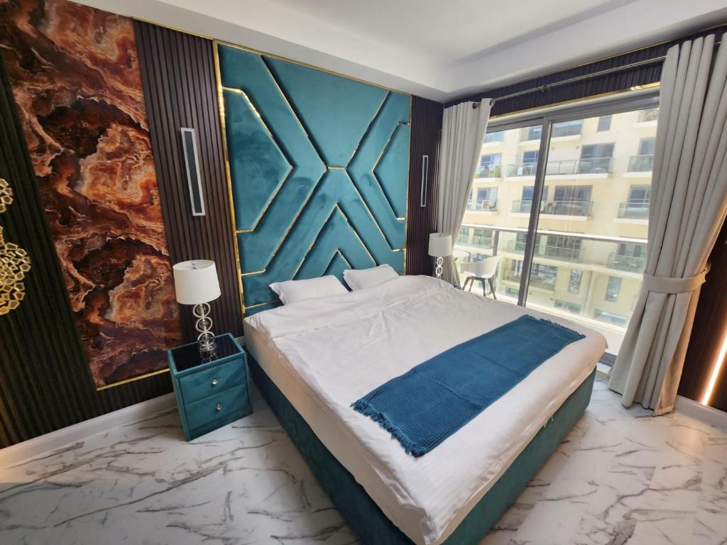 Postel nebo postele na pokoji v ubytování Marjan Island Beautiful Apartment Sea Side View Beach Luxury Rooms Ras Al Khaimah UAE