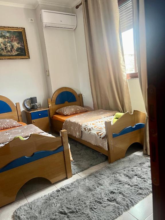 Postel nebo postele na pokoji v ubytování Cozy Rooms Korce