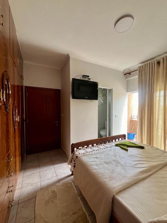 Postel nebo postele na pokoji v ubytování Cozy Rooms Korce