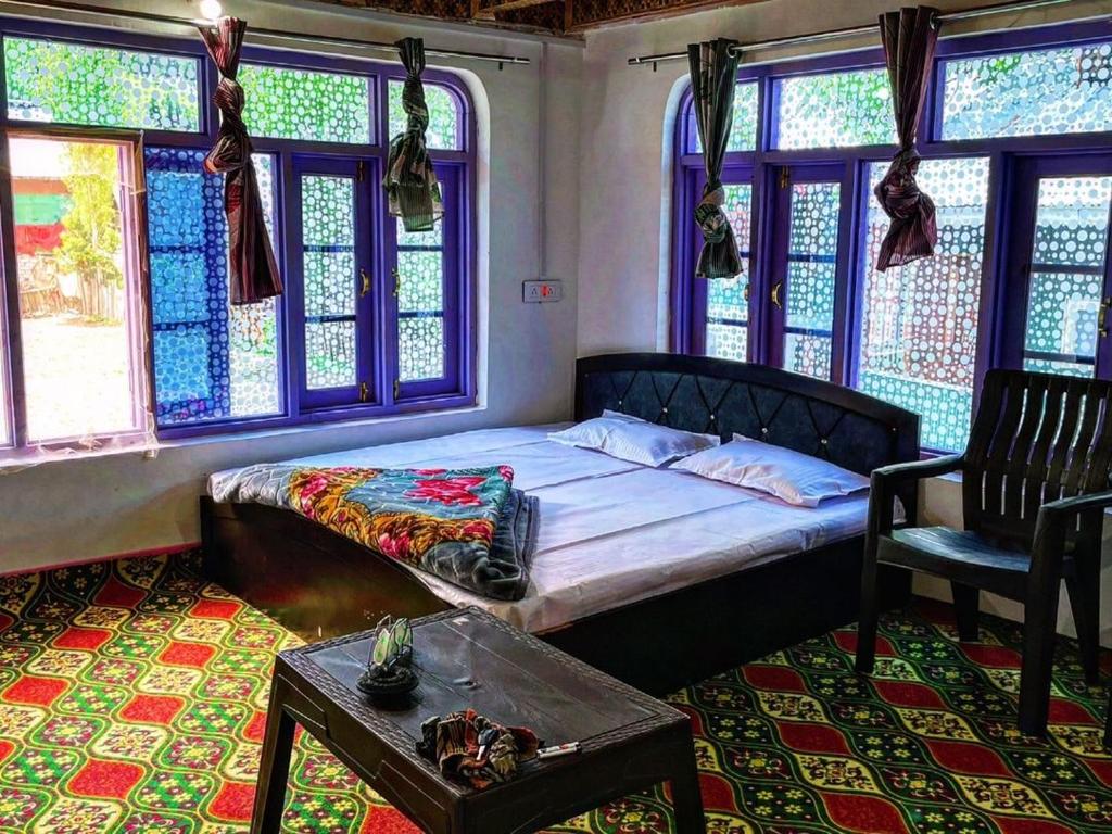 Ένα ή περισσότερα κρεβάτια σε δωμάτιο στο Zytoon homestay