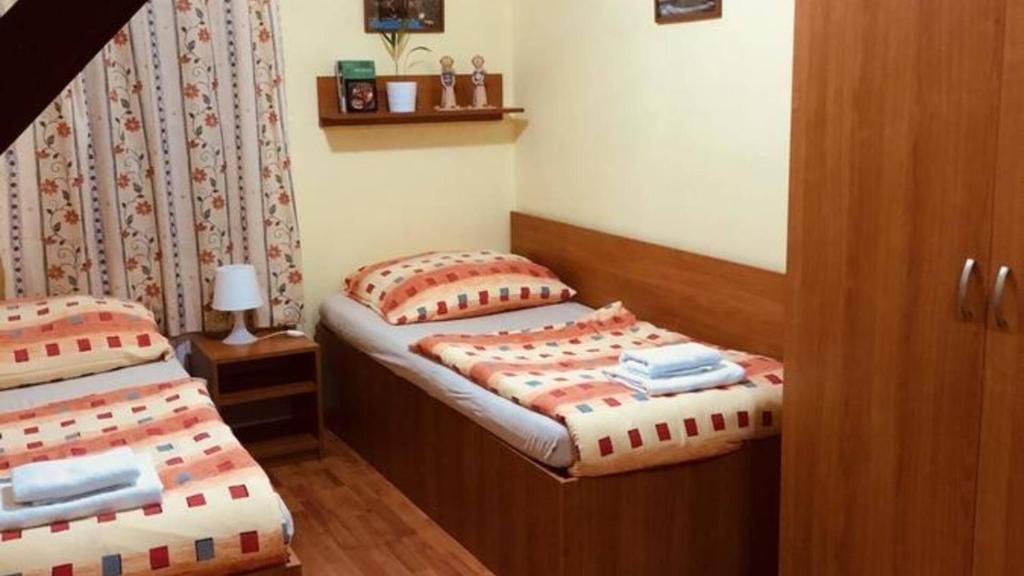 Postel nebo postele na pokoji v ubytování Penzion Relax Kadaň
