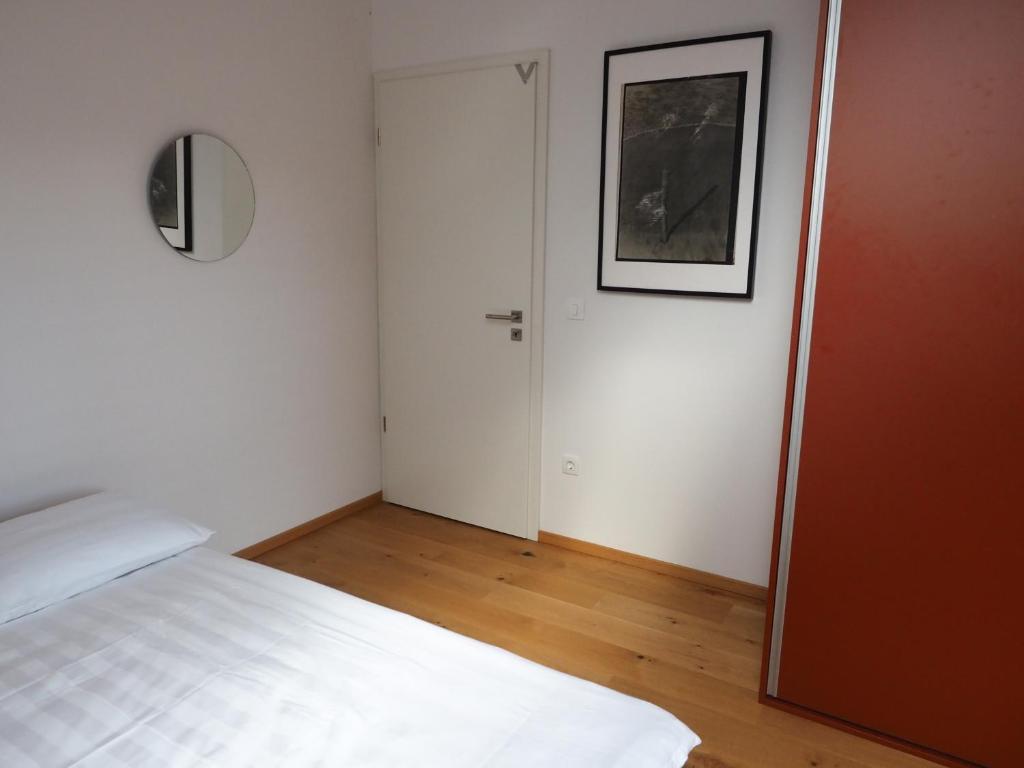 Postel nebo postele na pokoji v ubytování Hiša Eva
