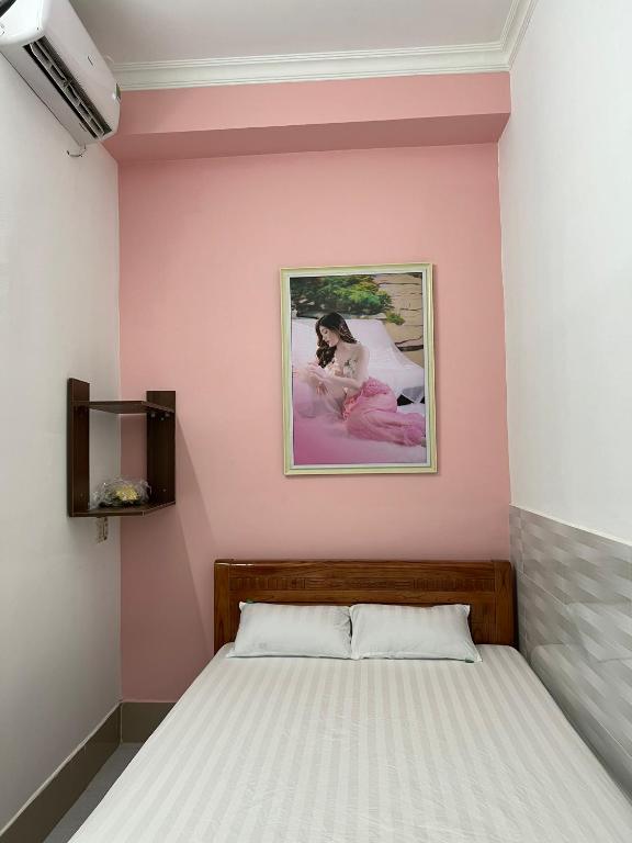 Postel nebo postele na pokoji v ubytování An Gia Motel