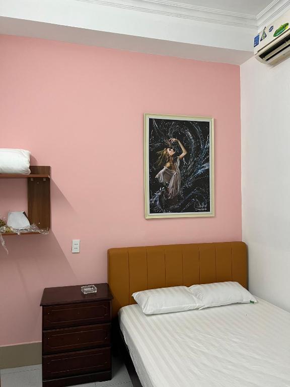 Postel nebo postele na pokoji v ubytování An Gia Motel