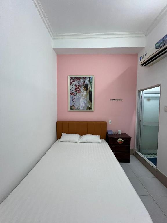 Postel nebo postele na pokoji v ubytování An Gia Motel
