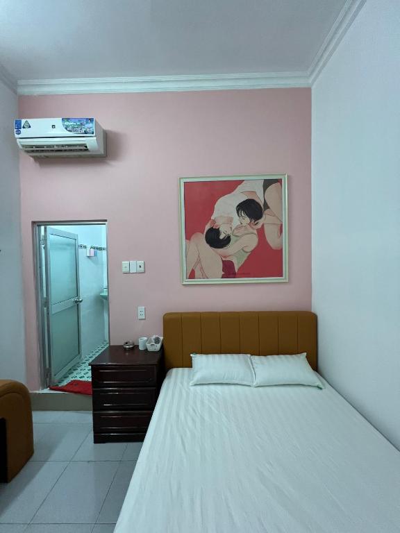 Postel nebo postele na pokoji v ubytování An Gia Motel