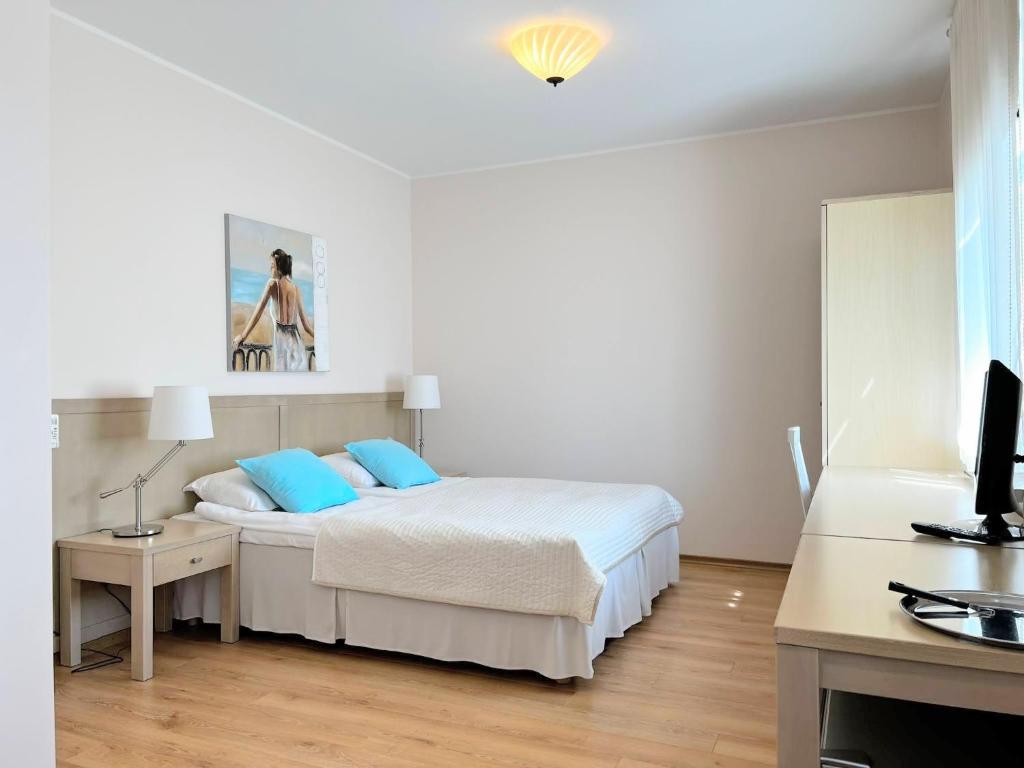 Postel nebo postele na pokoji v ubytování Tulbi Guesthouse