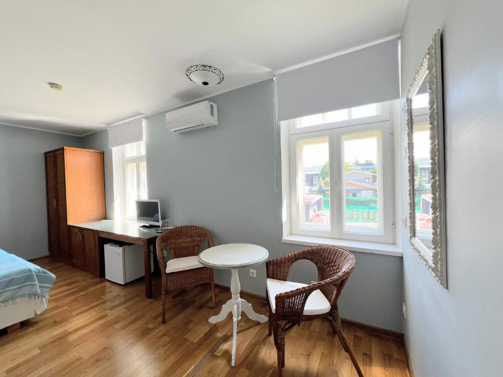 Postel nebo postele na pokoji v ubytování Tulbi Guesthouse