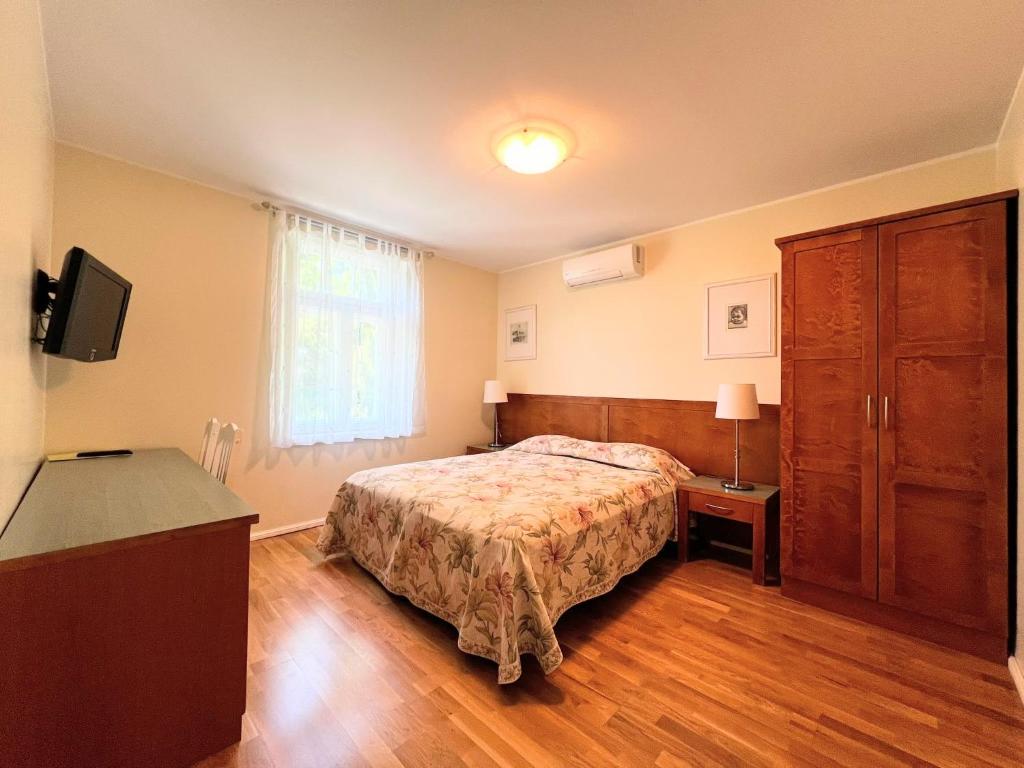 Postel nebo postele na pokoji v ubytování Tulbi Guesthouse