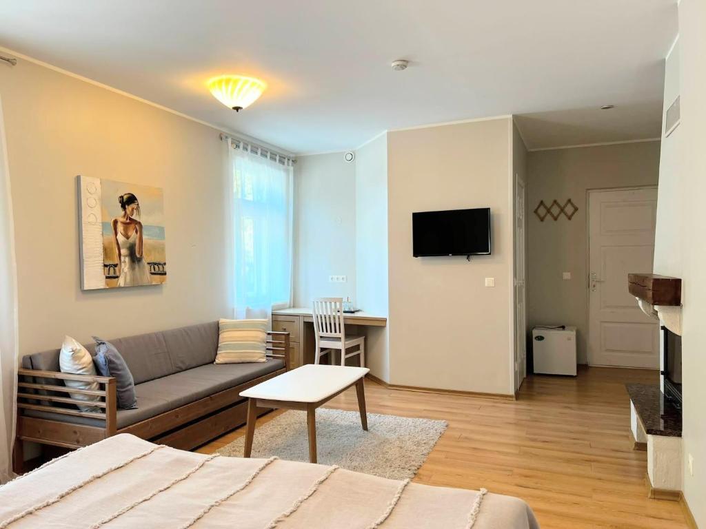 TV a/nebo společenská místnost v ubytování Tulbi Guesthouse