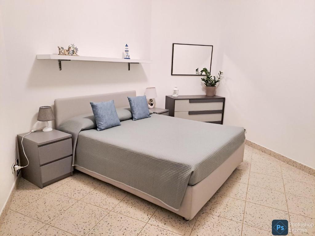 Postel nebo postele na pokoji v ubytování EmyFrancesco house