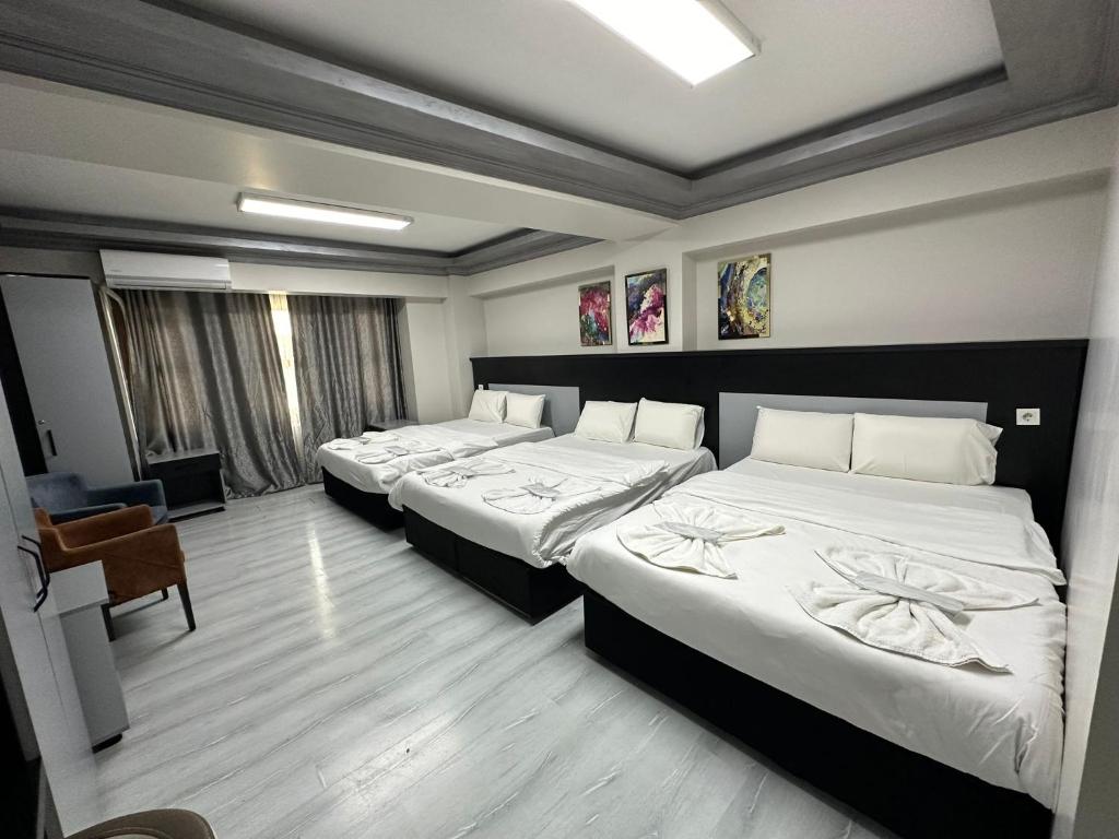 Postel nebo postele na pokoji v ubytování Retrol Hotel