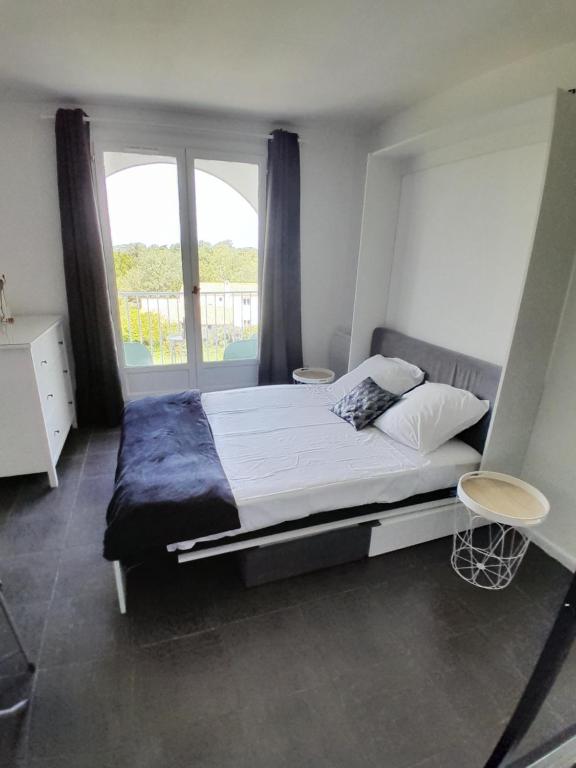 Postel nebo postele na pokoji v ubytování Studio Balcon Narbonne Centre