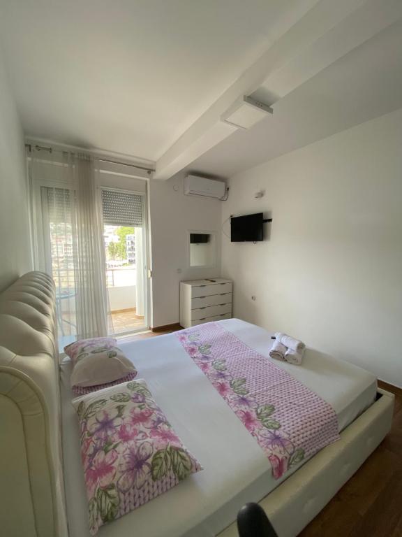 Postel nebo postele na pokoji v ubytování Seafront Apartments