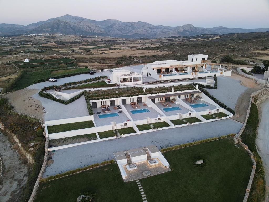an aerial view of a house with a pool at La Grande Vue-Private hilltop villas with private pools in Vívlos