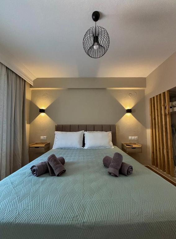 Postel nebo postele na pokoji v ubytování Serenity Apartment