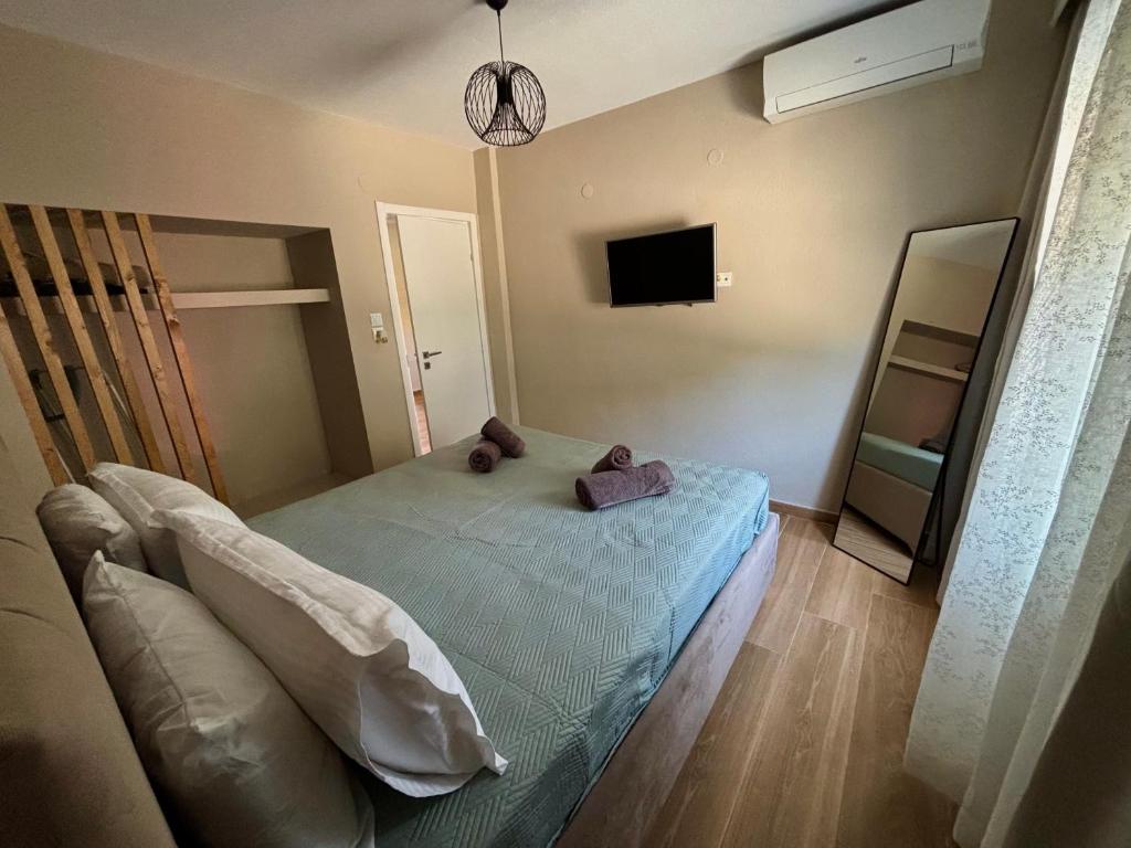 Postel nebo postele na pokoji v ubytování Serenity Apartment