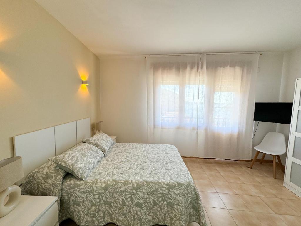 Postel nebo postele na pokoji v ubytování Apartamento LB, vistas a la ría