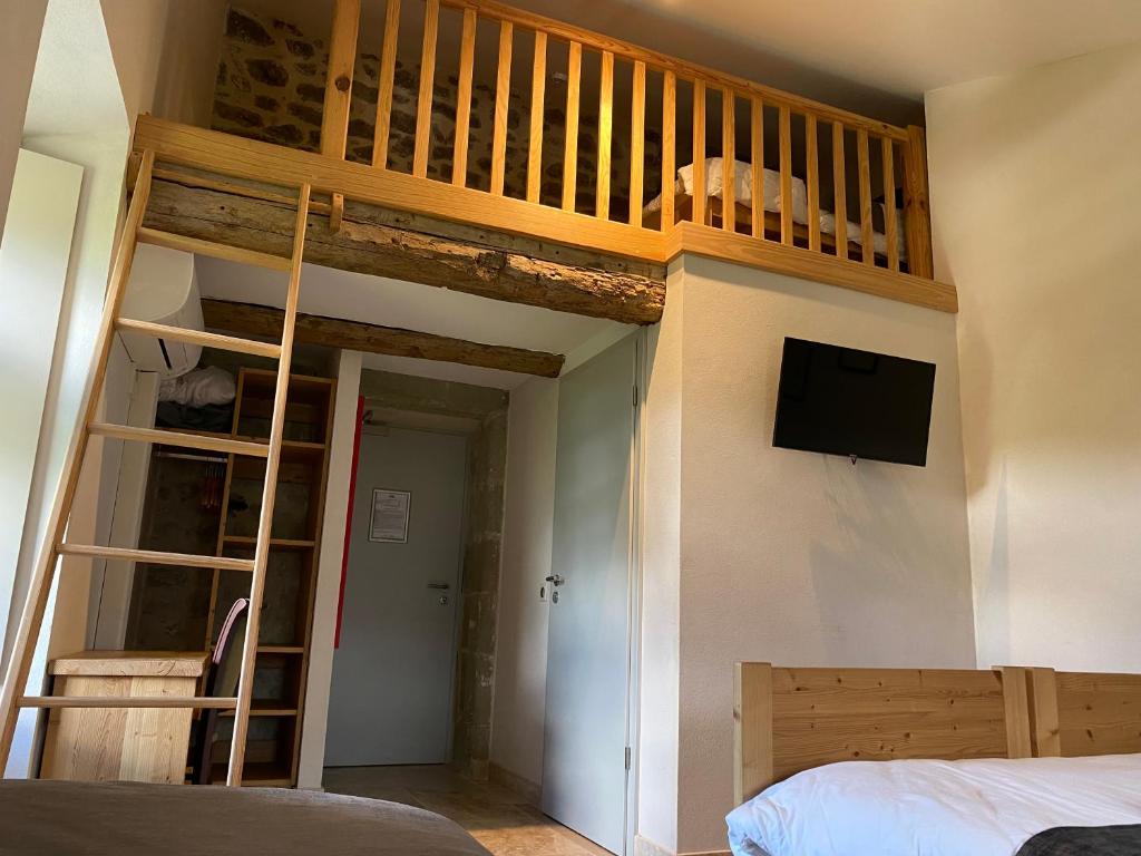Postel nebo postele na pokoji v ubytování Château du Poët-Célard