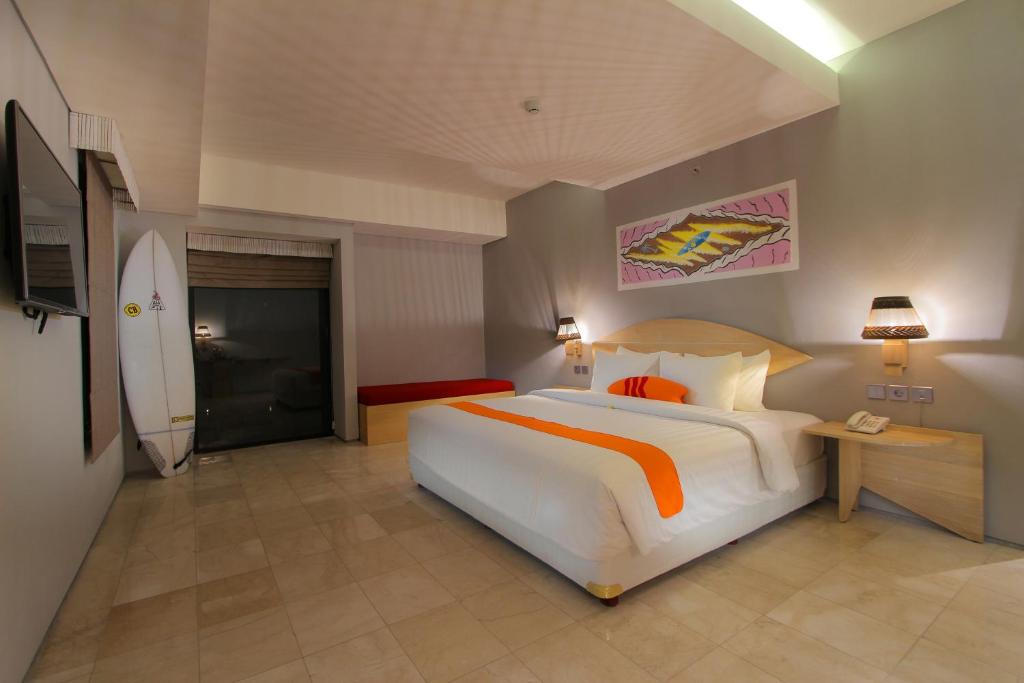 Postel nebo postele na pokoji v ubytování Koa D Surfer Hotel