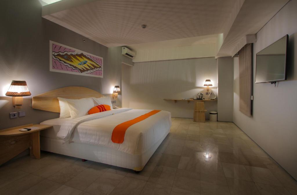 Postel nebo postele na pokoji v ubytování Koa D Surfer Hotel
