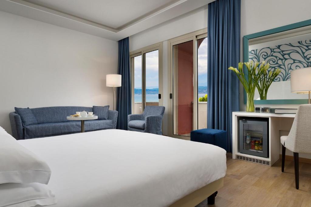 Postel nebo postele na pokoji v ubytování Hotel Continental Wellness & Spa