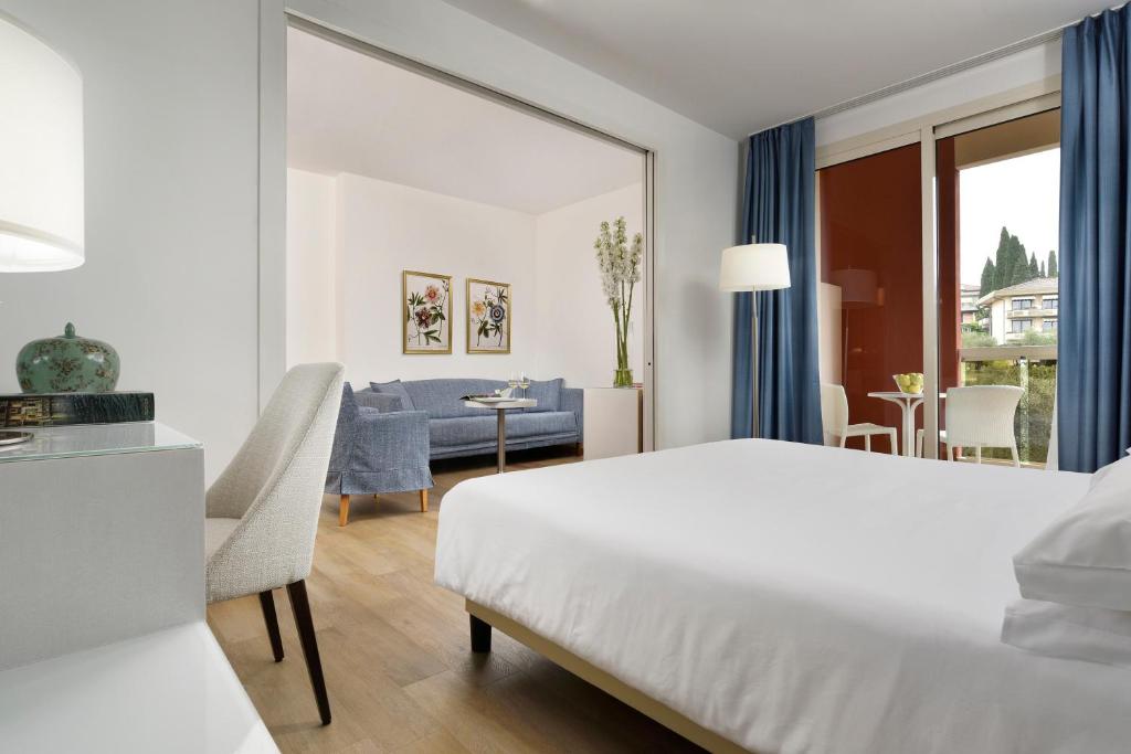 Postel nebo postele na pokoji v ubytování Hotel Continental Wellness & Spa