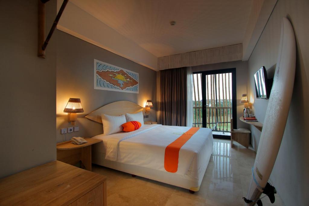 Postel nebo postele na pokoji v ubytování Koa D Surfer Hotel