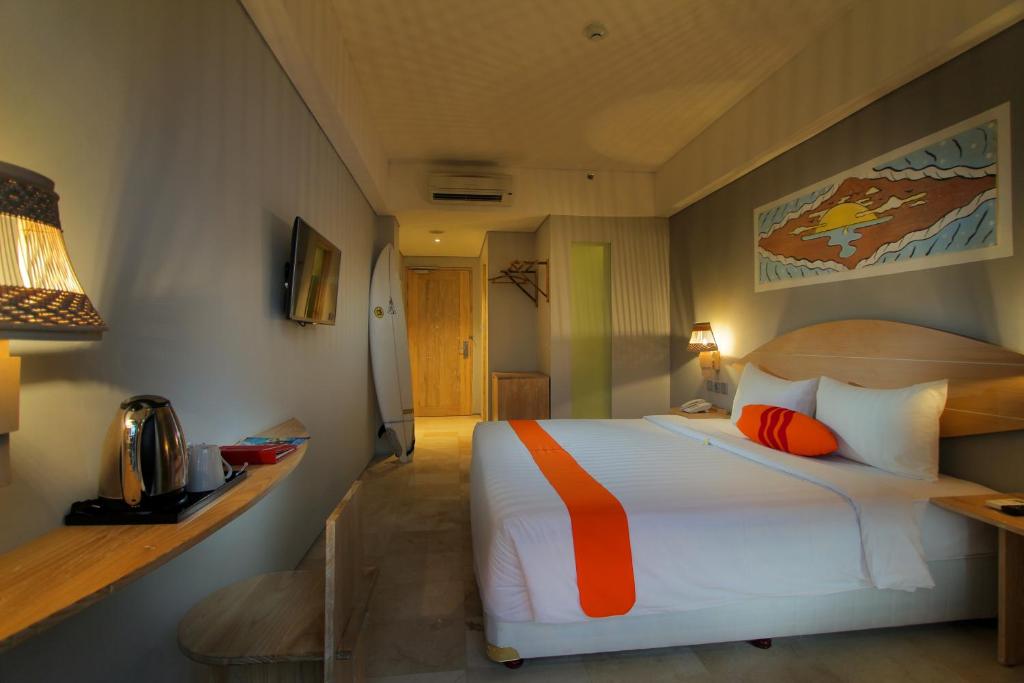 Postel nebo postele na pokoji v ubytování Koa D Surfer Hotel