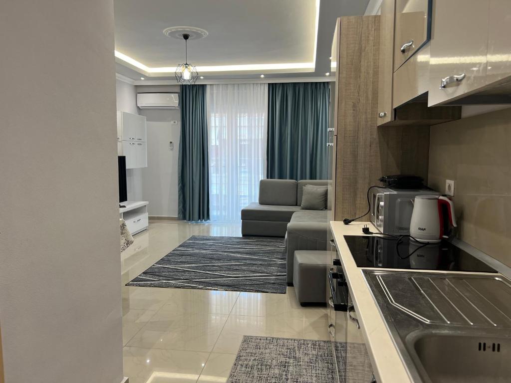 Kuchyň nebo kuchyňský kout v ubytování Fishta Apartment Q6 47