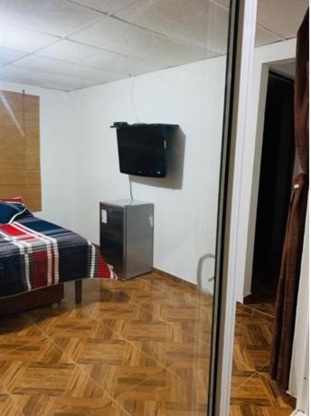 TV a/nebo společenská místnost v ubytování Finca San Jerónimo