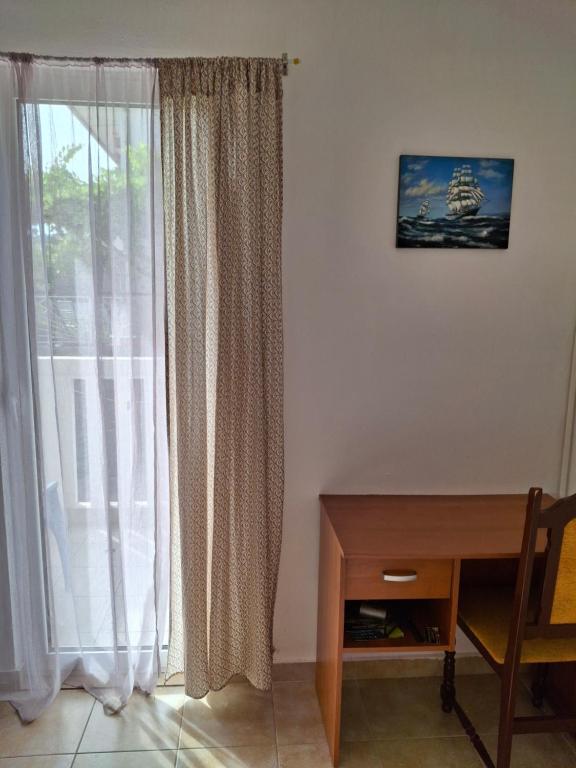 TV a/nebo společenská místnost v ubytování Apartmani SAMB Igalo