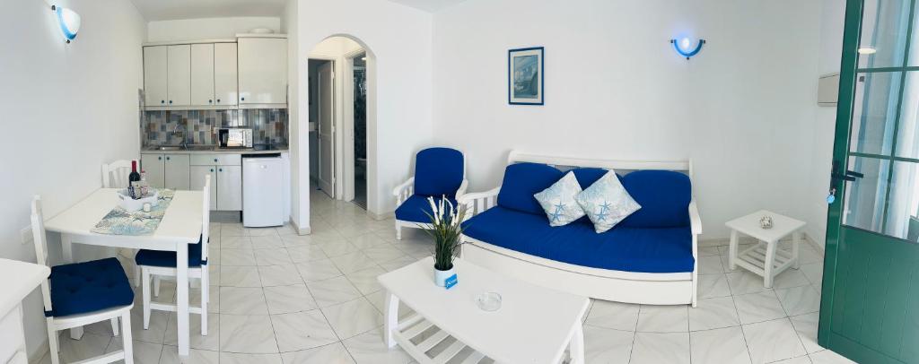 A kitchen or kitchenette at -MONTORIAN Apartments -LANZAROTE