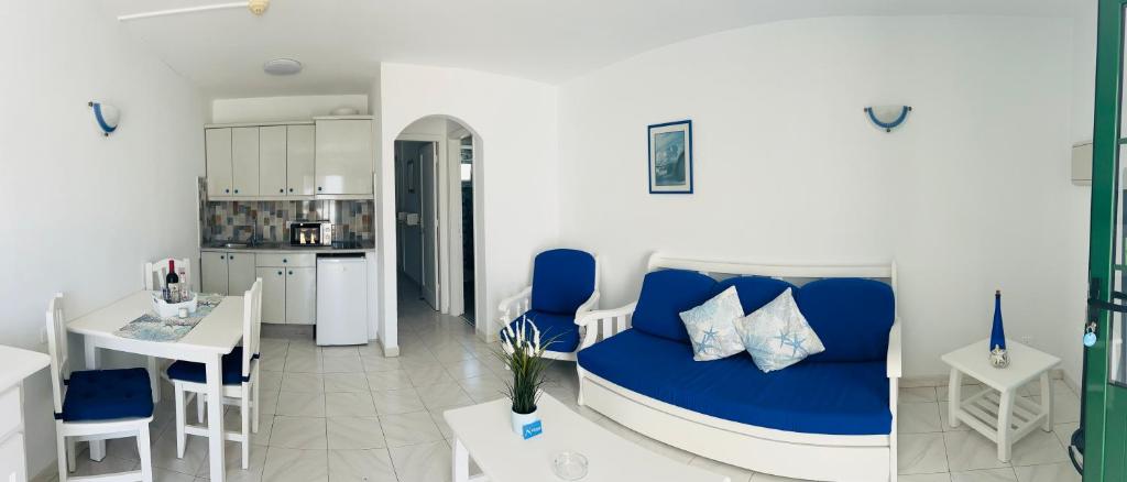 A kitchen or kitchenette at -MONTORIAN Apartments -LANZAROTE