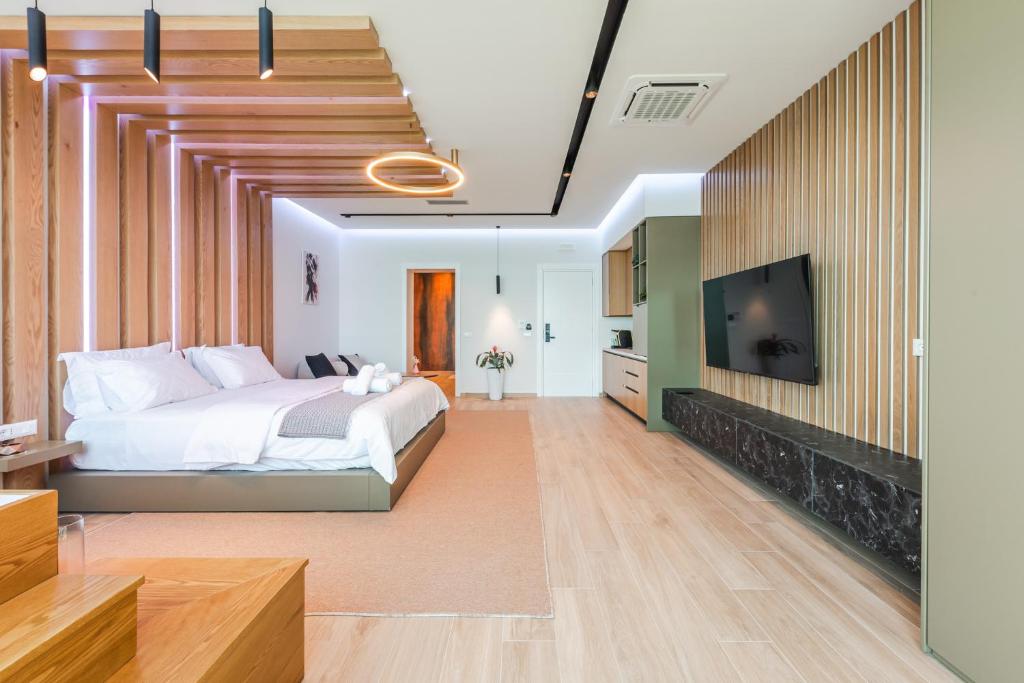 Postel nebo postele na pokoji v ubytování Marina Luxury Suites by PS