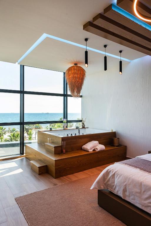 Postel nebo postele na pokoji v ubytování Marina Luxury Suites by PS