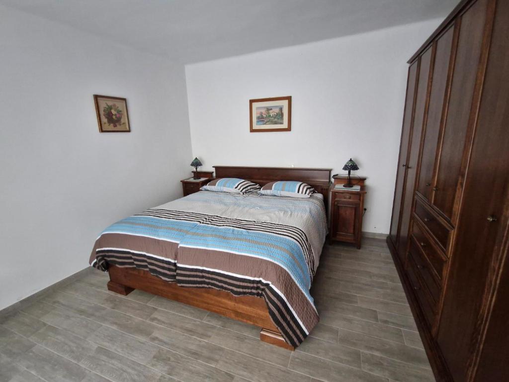 Postel nebo postele na pokoji v ubytování Apartma Ježevi