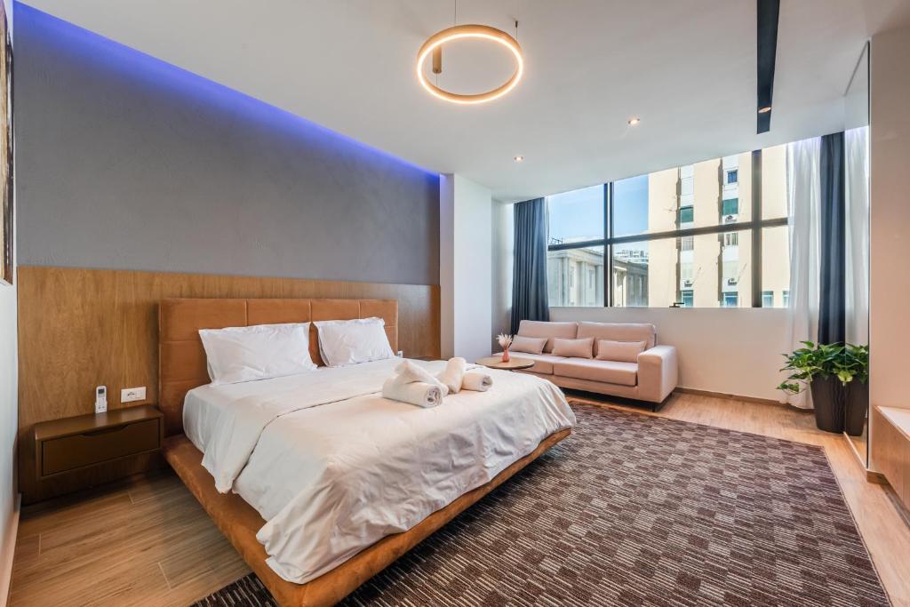 Postel nebo postele na pokoji v ubytování Marina Luxury Suites by PS