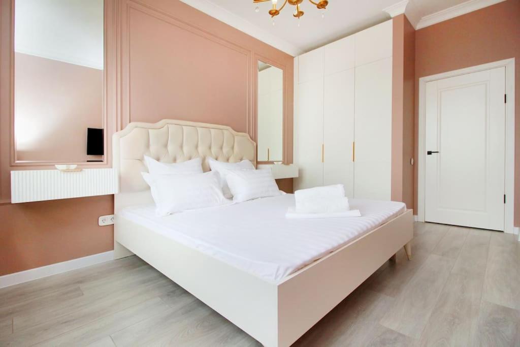 Llit o llits en una habitació de Forum Residence