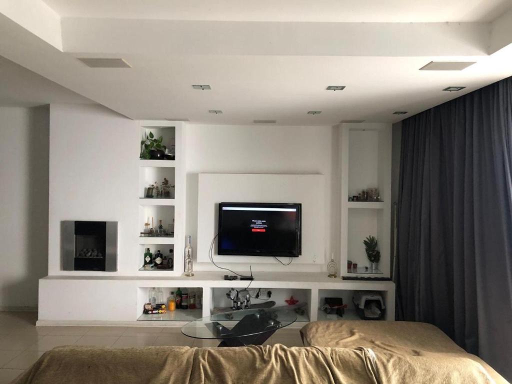 TV a/nebo společenská místnost v ubytování Sol's Sliema Homestay