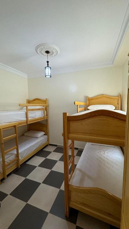 Postel nebo postele na pokoji v ubytování Appartement 4 en bord de la mer à Azla